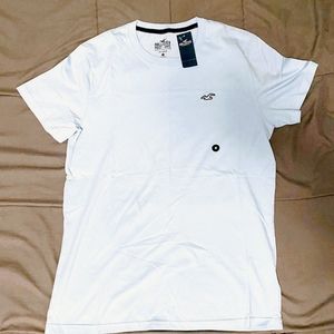 Hollister mens size medium tshirt. COLOR LOOKS WHITE IN PIC BUT  IS LIGHT BLUE